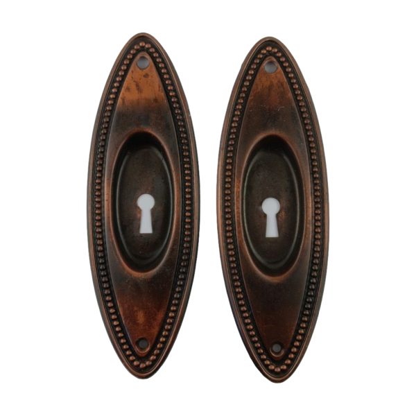 Oval Bead Pocket Door Pair Keyhole