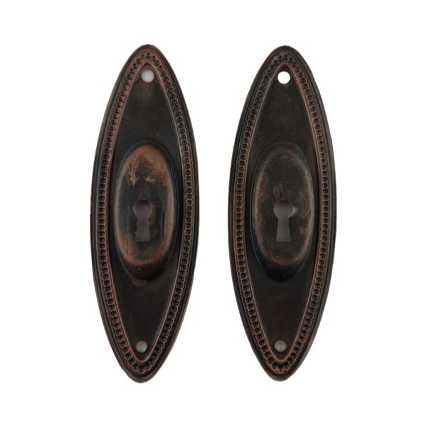 Oval Bead Pocket Door Pair Keyhole
