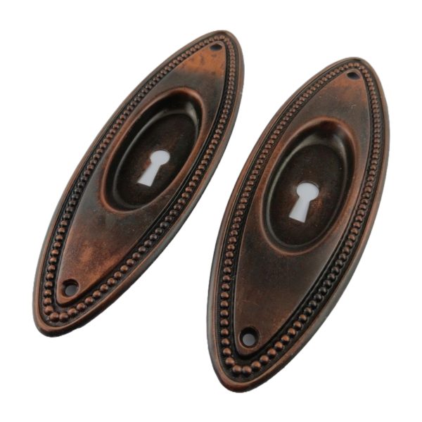 Oval Bead Pocket Door Pair Keyhole